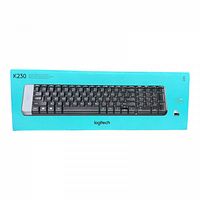 Front view of Logitech K230 wireless keyboard in its original teal box showing the full keyboard and Logitech branding.