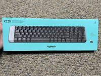 Photo of the Logitech K230 keyboard box showing the front with keyboard image and model number K230.
