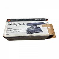 Original box for Black & Decker Basic Finishing Sander model 7448, showing product details and branding.