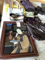 Overview of painting, purses, belt, scarves, clothing