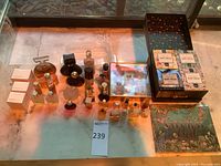 Overview of entire lot including perfumes, body creams, cosmetic boxes and eyeshadow palette