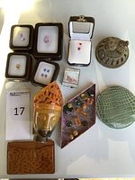 Overview of entire lot on white surface