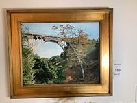 Full view of framed painting showing overall scene and condition