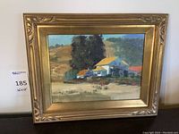 Front view of the framed painting showing the ranch scene