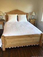 Full assembled bed with headboard, footboard, side rails and slats