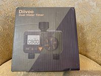 Front view of Diivoo Dual Water Timer box showing product image and brand name on black background.