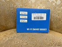 Box front showing compatibility with App Store, Google Play, and Amazon Alexa voice control.