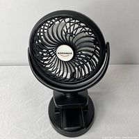 Front view of Addsmile wireless clip fan showing blades and brand logo on grill.