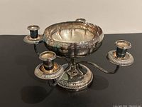 Front view of centrepiece showing bowl and two candle arms