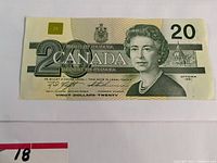 Full front view of the 1991 Canadian $20 bill showing Queen Elizabeth II, denomination, and official signatures.
