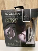 Closed box front showing branding and headset image