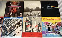Six LPs laid out in two rows including Leon Russell, George Harrison, Pink Floyd, Beatles 1967–1970, All Star Rock & Roll Revue, The Lovin’ Spoonful.