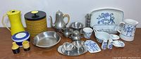 Overview of entire lot showing metal, plastic and ceramic items