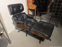 Front angle view of chair and ottoman showing overall set