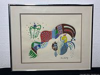 Full view of the framed lithograph showing abstract colorful shapes and mint condition frame.