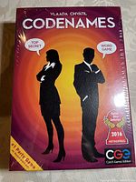 Front cover of new sealed Codenames party game box showing brand, edition, and accolades