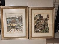 Two San Francisco-themed framed prints showing cable car and Lombard Street.