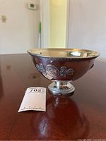 Front view of silver plated champagne basin with hallmarked detail visible