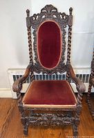Front view of entire chair showing frame and upholstery