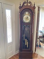 Front view of the clock showing overall condition and design