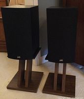 Front view of two PSB speakers on stands
