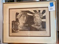 Framed screen print collage showing classical busts in black and white, titled 'Men of Athens'.