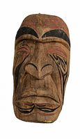 Front view of small carved wooden mask with painted facial features in black and brown hues, showing strong contours and slight wear.