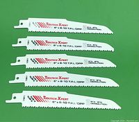 Photo of five ToolTech Xpert reciprocating saw blades laid out side by side showing brand, size, teeth per inch, and metal demolition designation.