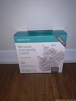 Front of box showing Nanobébé Transition Bottle Stage 2 3 pack, 8 oz bottles, new condition.