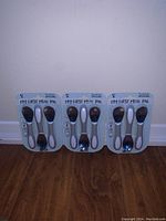 Three packs of toddler spoons, each pack contains three spoons labeled 'My First Meal Pal', white handles and dark flexible spoon heads