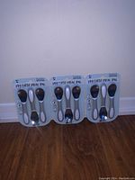 Three packages of toddler spoons, each with two spoons. New condition, 'My First Meal Pal' by Munchkin.