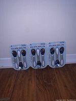 Photo showing three packages of new toddler spoons labeled 'My First Meal Pal', two spoons per pack.