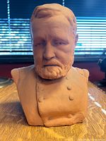 Front view of the Ulysses S Grant pottery bust head showing detailed facial features and military coat buttons