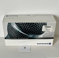 Box of Beyerdynamic professional microphone viewed from above showing price sticker $99.00 and product branding