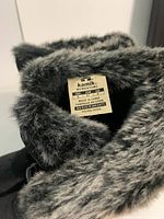 Close-up of interior label showing Kamik brand, Momentum line, size 6 US, made in China.