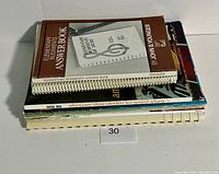 Stack of various guitar music and instruction books showing titles and condition.