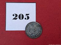 Front side of 1787 Charles III 1/2 Reale coin showing profile bust of Charles III with inscription and date.