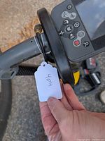 Control unit mounted on adjustable shaft with armrest and digital display