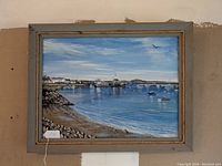 Full view of framed harbor painting
