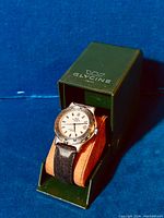 Watch displayed on cushion inside green Glycine presentation box