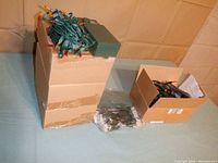 Lot of Bethlehem Lights brand battery-operated string lights sets: three mini-colored sets, one clear set, one multi-color set, packed in boxes and plastic bag.