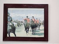 Full shot of the framed 1981 Buzkashi game photo print showing the entire image and frame.
