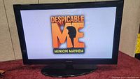 Samsung 42 inch TV powered on showing Despicable Me: Minion Mayhem image on screen.