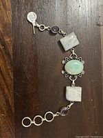 Top view of bracelet showing arrangement of stones and silver links