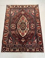 Full view of hand knotted Persian Bakhtiar rug showing overall design and colors