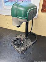 Overall view of propane mosquito trap on stand and base