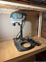 Full view of the mosquito trap including head, stand, and base