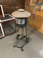 Front view showing full trapper on stand