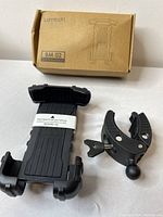 Overall display of the Lamicall BM02 bike phone mount and handlebar clamp with original box.