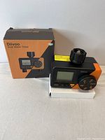 Diivoo Dual Water Timer next to original box on white surface